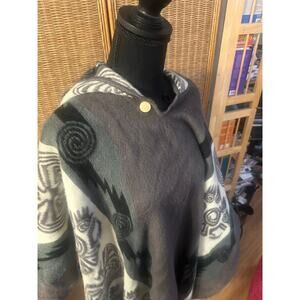 Cozy hooded alpaca-blend poncho with a slate gray, black, and white pattern